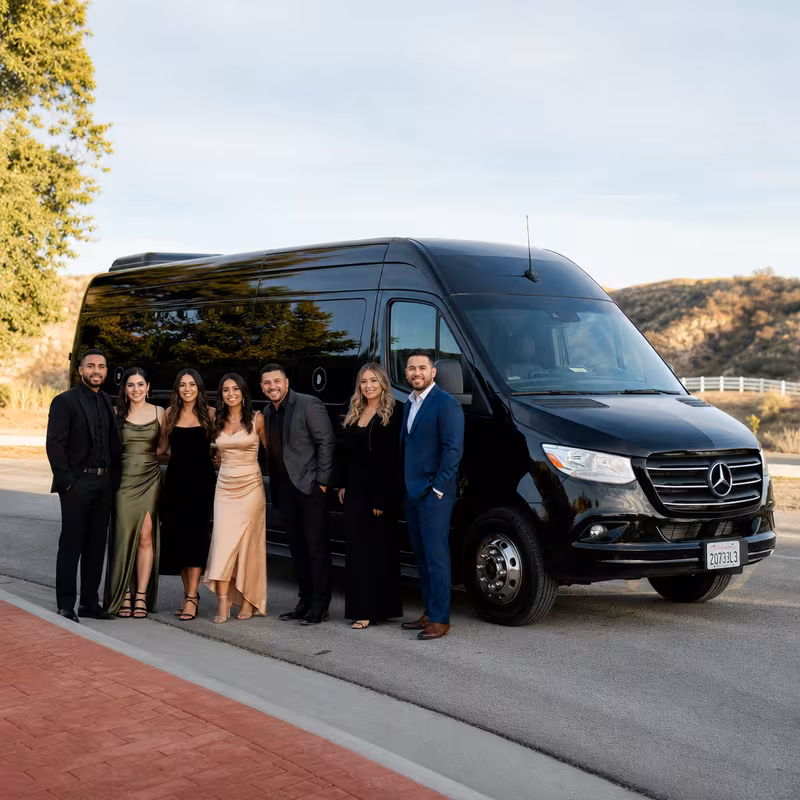 Group beside a Mercedes Sprinter limo from the Santa Clarita fleet