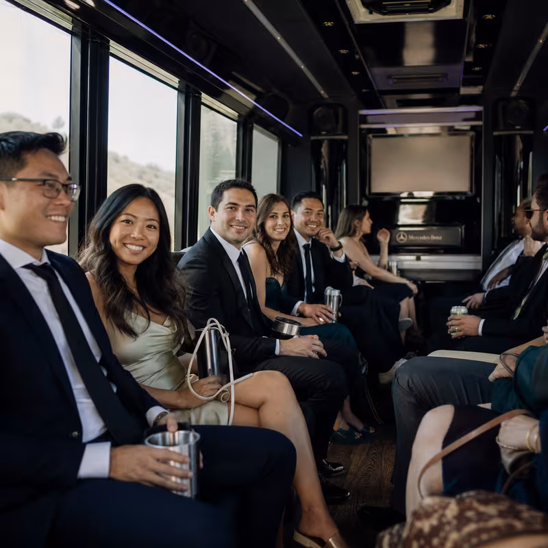 Wedding guests seated inside a Santa Clarita party bus