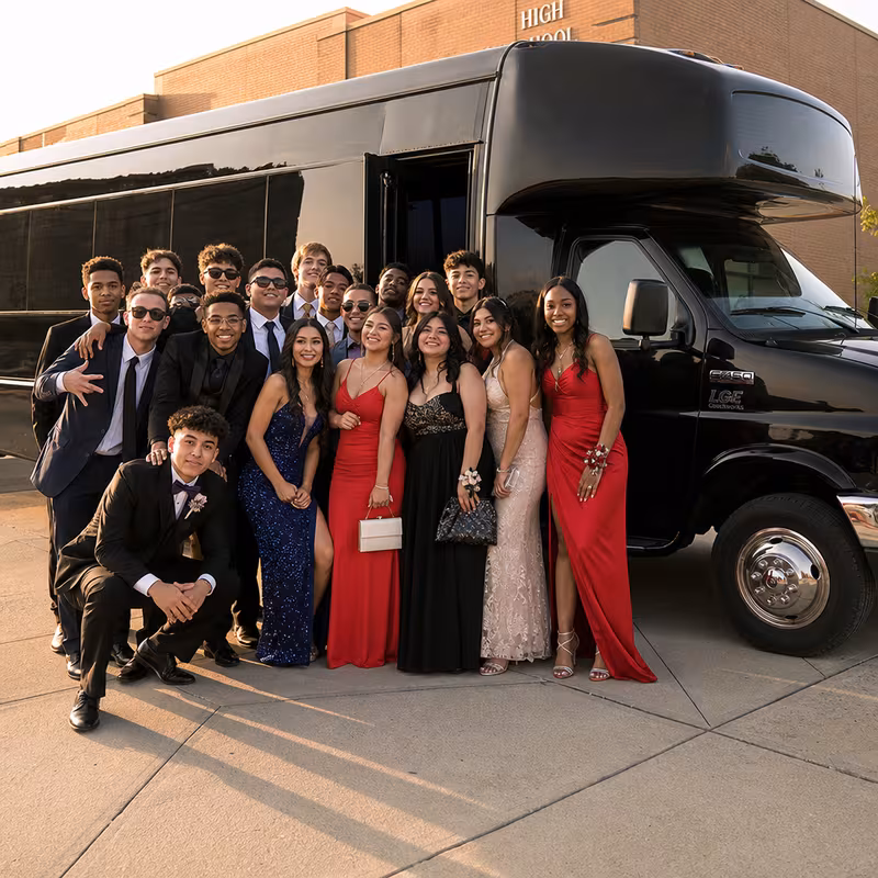 Group boarding a white charter bus for Prom & Homecoming Transportation transportation in Santa Clarita