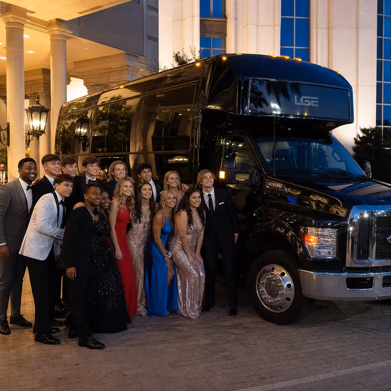 Party bus interior with wraparound leather seating and LED lighting in Santa Clarita