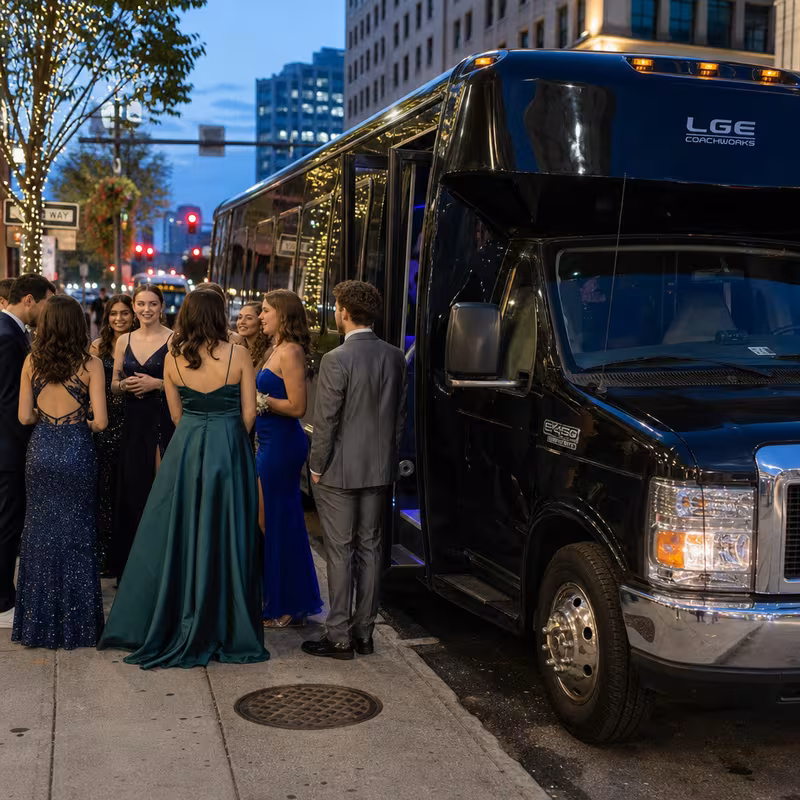 Passengers loading luggage while boarding an Santa Clarita group shuttle